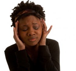 Ethnic Young Woman Has a Headache